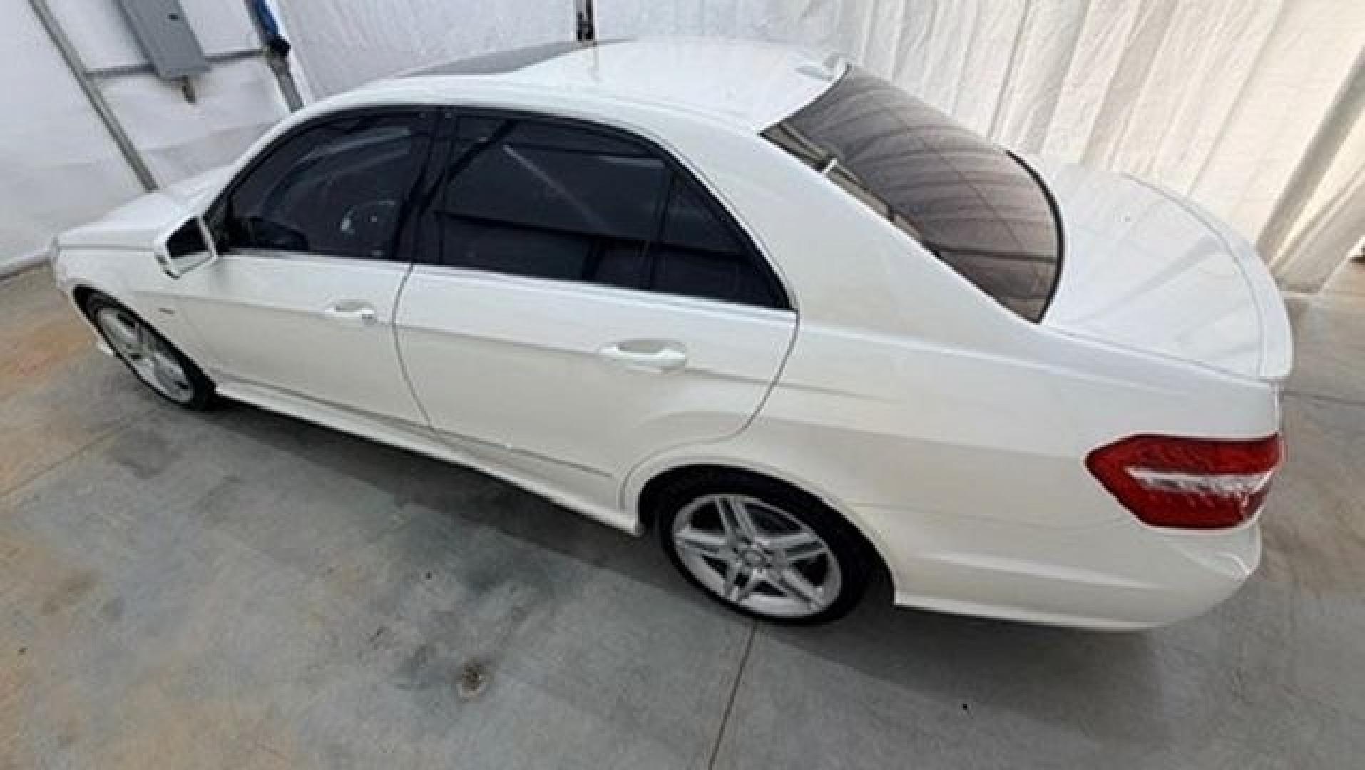 2012 White Mercedes-Benz E-Class E350 Sedan (WDDHF5KB0CA) with an 3.5L V6 DOHC 24V engine, 7-Speed Automatic transmission, located at 1806 Veterans Memorial Hwy SW, Austell, GA, 30168, (770) 944-9558, 33.817959, -84.606987 - This Benz E-Class has brand-new tires and a paint job in good condition. There is a small crack in the rear bumper. Inside, the interior is in good condition and smells great; it comes from a non-smoking vehicle. The seam on the driver's seat has a patch.- Photo#2