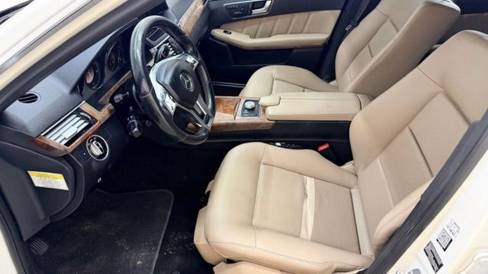 2012 White Mercedes-Benz E-Class E350 Sedan (WDDHF5KB0CA) with an 3.5L V6 DOHC 24V engine, 7-Speed Automatic transmission, located at 1806 Veterans Memorial Hwy SW, Austell, GA, 30168, (770) 944-9558, 33.817959, -84.606987 - This Benz E-Class has brand-new tires and a paint job in good condition. There is a small crack in the rear bumper. Inside, the interior is in good condition and smells great; it comes from a non-smoking vehicle. The seam on the driver's seat has a patch.- Photo#11