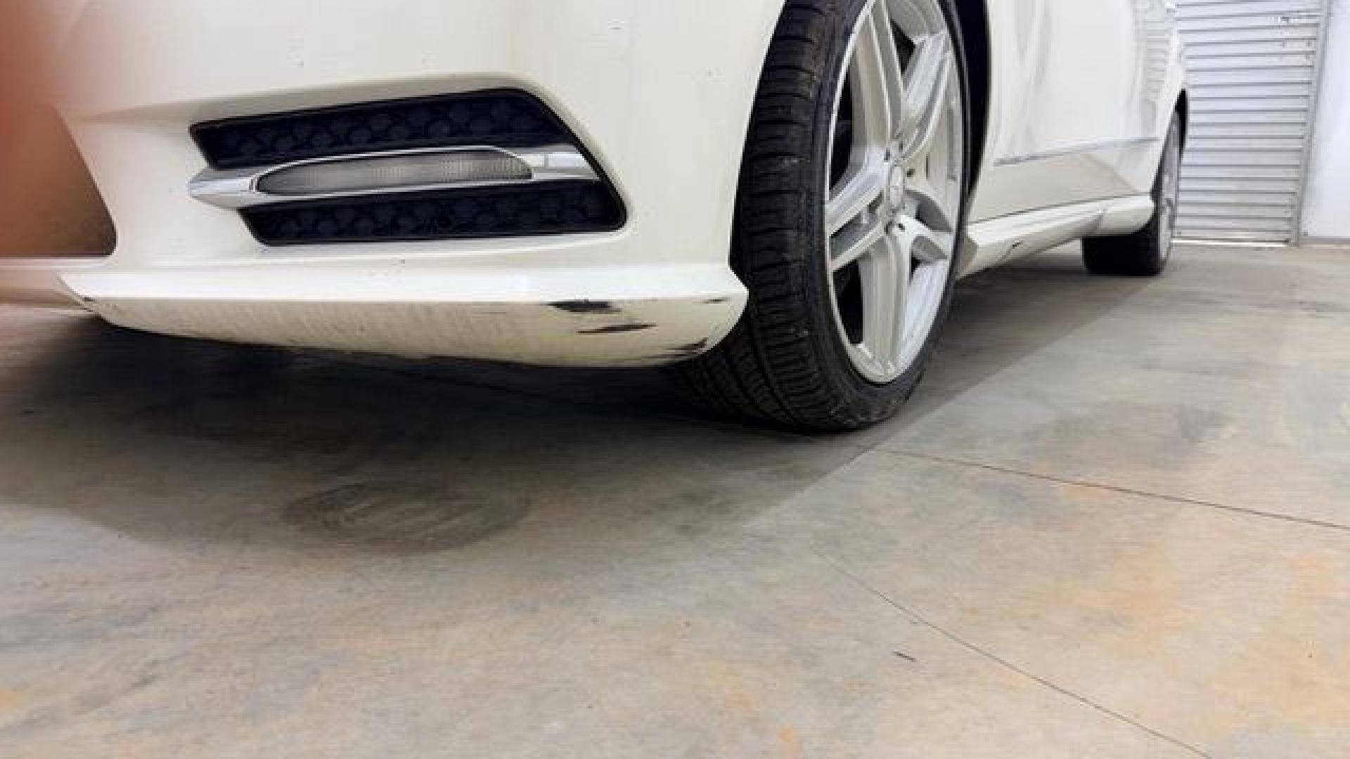 2012 White Mercedes-Benz E-Class E350 Sedan (WDDHF5KB0CA) with an 3.5L V6 DOHC 24V engine, 7-Speed Automatic transmission, located at 1806 Veterans Memorial Hwy SW, Austell, GA, 30168, (770) 944-9558, 33.817959, -84.606987 - This Benz E-Class has brand-new tires and a paint job in good condition. There is a small crack in the rear bumper. Inside, the interior is in good condition and smells great; it comes from a non-smoking vehicle. The seam on the driver's seat has a patch.- Photo#18