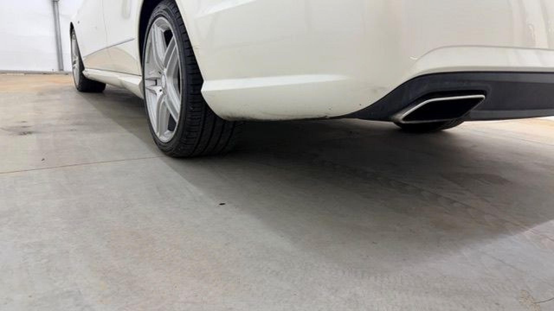 2012 White Mercedes-Benz E-Class E350 Sedan (WDDHF5KB0CA) with an 3.5L V6 DOHC 24V engine, 7-Speed Automatic transmission, located at 1806 Veterans Memorial Hwy SW, Austell, GA, 30168, (770) 944-9558, 33.817959, -84.606987 - This Benz E-Class has brand-new tires and a paint job in good condition. There is a small crack in the rear bumper. Inside, the interior is in good condition and smells great; it comes from a non-smoking vehicle. The seam on the driver's seat has a patch.- Photo#19