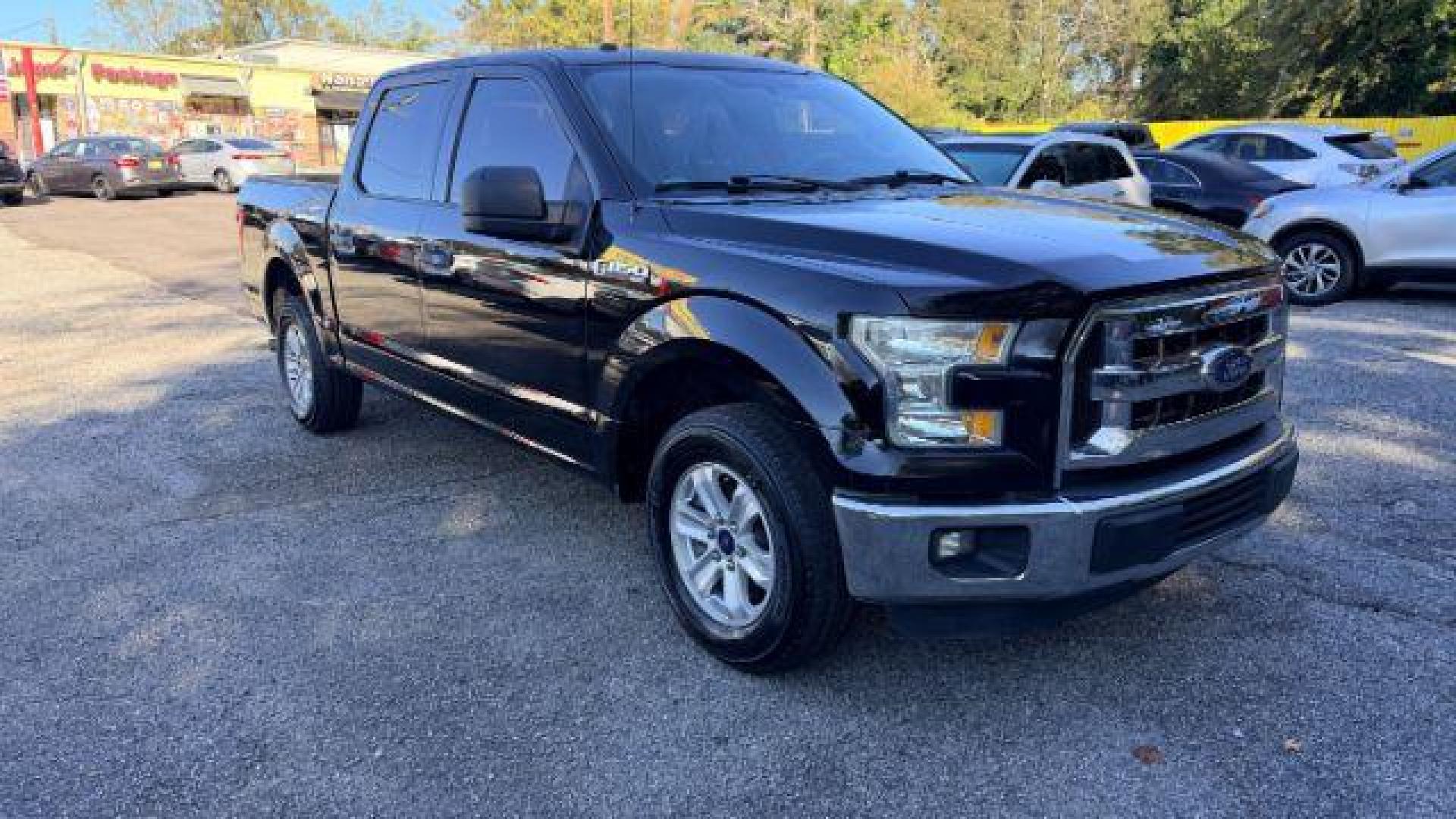 2016 Black Ford F-150 XLT SuperCrew 6.5-ft (1FTEW1CFXGF) with an 5.0L V8 engine, 6-Speed Automatic transmission, located at 1806 Veterans Memorial Hwy SW, Austell, GA, 30168, (770) 944-9558, 33.817959, -84.606987 - Photo#2