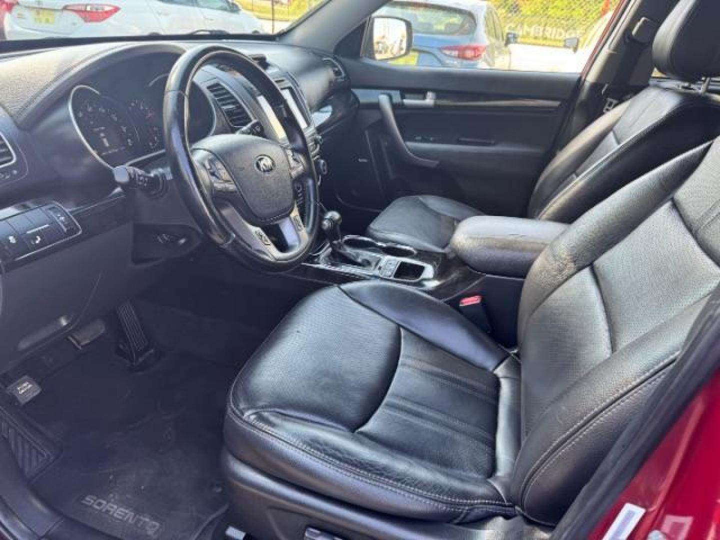 2015 Red Kia Sorento SX V6 FWD (5XYKW4A71FG) with an 3.3L V6 DOHC 24V engine, 6-Speed Automatic transmission, located at 1806 Veterans Memorial Hwy SW, Austell, GA, 30168, (770) 944-9558, 33.817959, -84.606987 - Photo#8