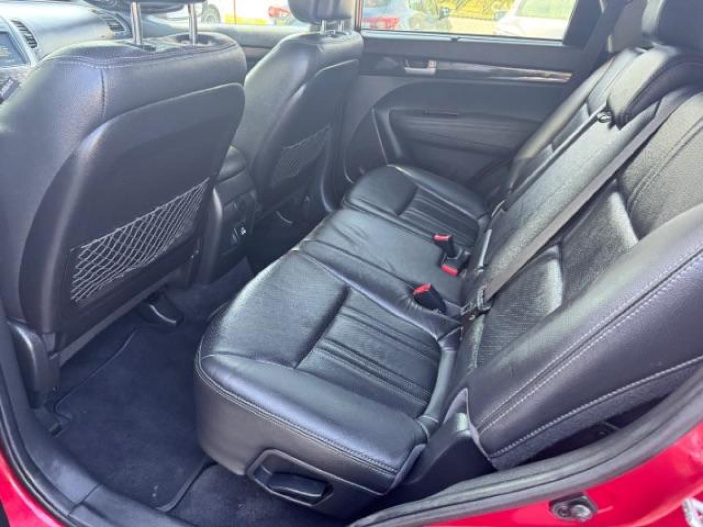 2015 Red Kia Sorento SX V6 FWD (5XYKW4A71FG) with an 3.3L V6 DOHC 24V engine, 6-Speed Automatic transmission, located at 1806 Veterans Memorial Hwy SW, Austell, GA, 30168, (770) 944-9558, 33.817959, -84.606987 - Photo#9