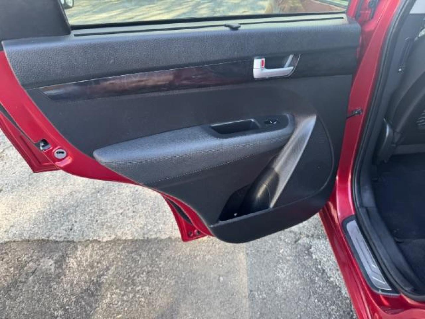 2015 Red Kia Sorento SX V6 FWD (5XYKW4A71FG) with an 3.3L V6 DOHC 24V engine, 6-Speed Automatic transmission, located at 1806 Veterans Memorial Hwy SW, Austell, GA, 30168, (770) 944-9558, 33.817959, -84.606987 - Photo#10