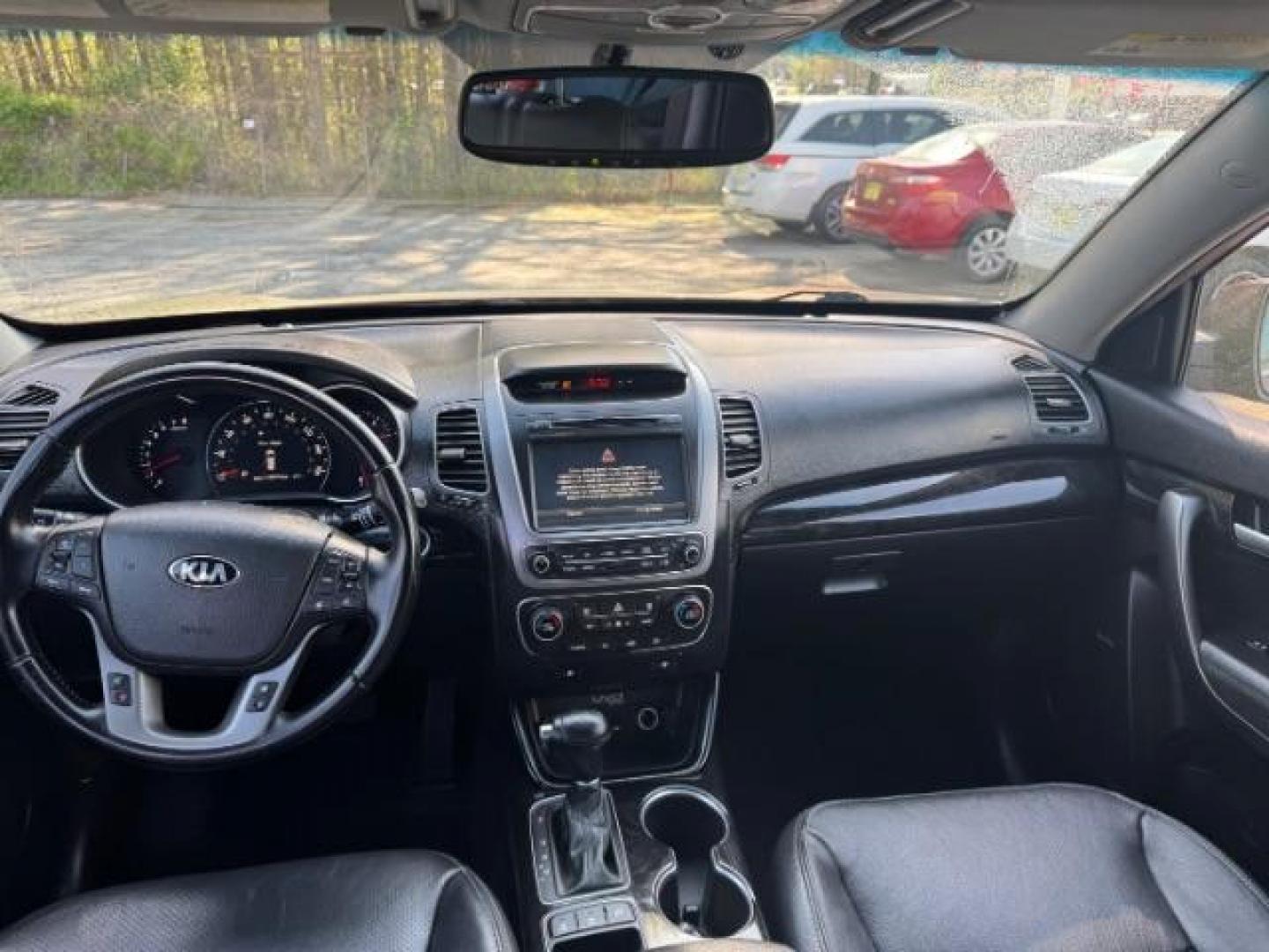 2015 Red Kia Sorento SX V6 FWD (5XYKW4A71FG) with an 3.3L V6 DOHC 24V engine, 6-Speed Automatic transmission, located at 1806 Veterans Memorial Hwy SW, Austell, GA, 30168, (770) 944-9558, 33.817959, -84.606987 - Photo#11