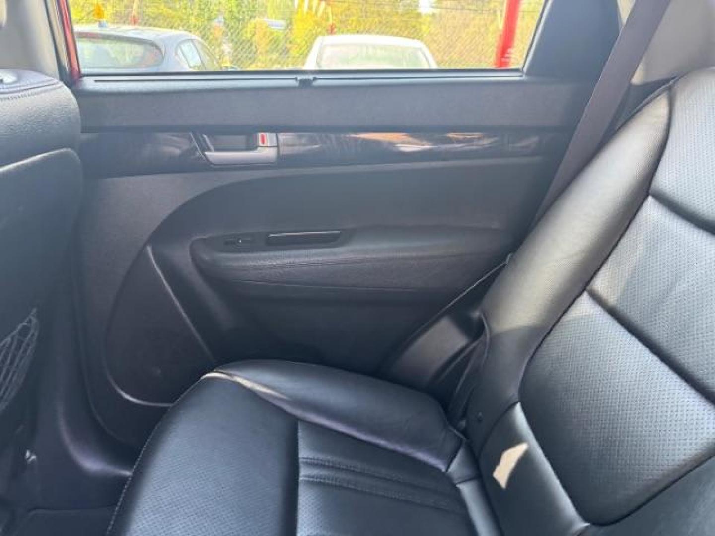 2015 Red Kia Sorento SX V6 FWD (5XYKW4A71FG) with an 3.3L V6 DOHC 24V engine, 6-Speed Automatic transmission, located at 1806 Veterans Memorial Hwy SW, Austell, GA, 30168, (770) 944-9558, 33.817959, -84.606987 - Photo#13