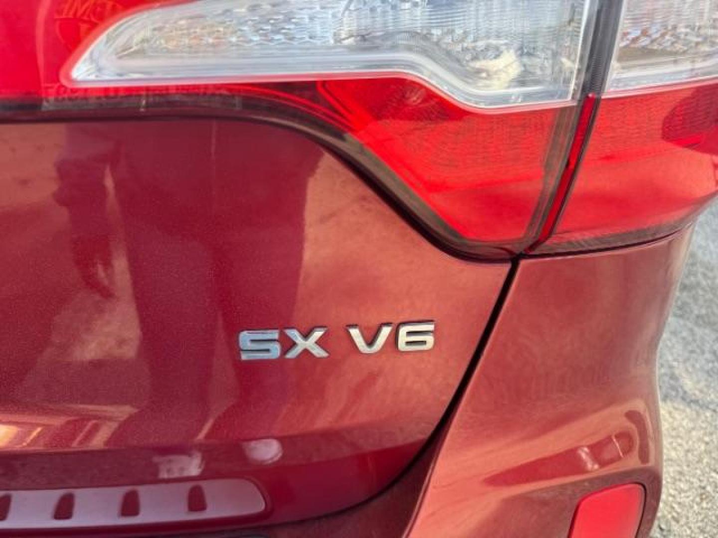 2015 Red Kia Sorento SX V6 FWD (5XYKW4A71FG) with an 3.3L V6 DOHC 24V engine, 6-Speed Automatic transmission, located at 1806 Veterans Memorial Hwy SW, Austell, GA, 30168, (770) 944-9558, 33.817959, -84.606987 - Photo#18