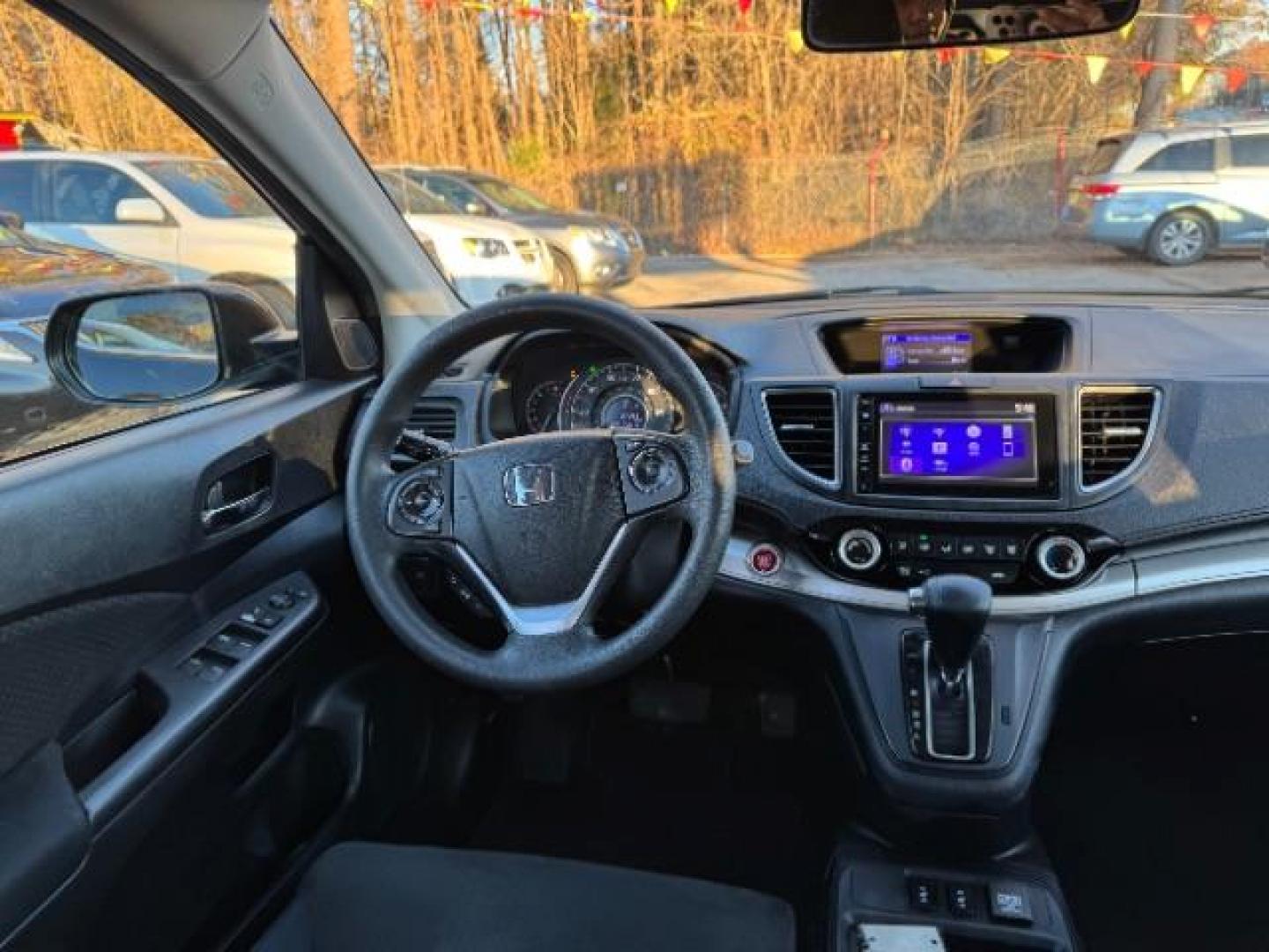 2016 Black Honda CR-V EX AWD (5J6RM4H54GL) with an 2.4L L4 DOHC 16V engine, Continuously Variable Transmission transmission, located at 1806 Veterans Memorial Hwy SW, Austell, GA, 30168, (770) 944-9558, 33.817959, -84.606987 - Photo#11