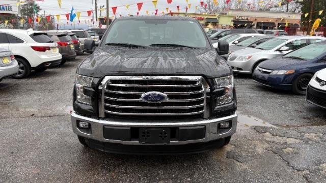 2015 Black Ford F-150 XLT SuperCrew 6.5-ft (1FTEW1CPXFF) with an 2.7L V6 DOHC 24V engine, 6-Speed Automatic transmission, located at 1806 Veterans Memorial Hwy SW, Austell, GA, 30168, (770) 944-9558, 33.817959, -84.606987 - Photo#1