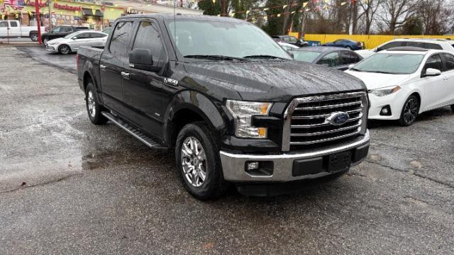 2015 Black Ford F-150 XLT SuperCrew 6.5-ft (1FTEW1CPXFF) with an 2.7L V6 DOHC 24V engine, 6-Speed Automatic transmission, located at 1806 Veterans Memorial Hwy SW, Austell, GA, 30168, (770) 944-9558, 33.817959, -84.606987 - Photo#2