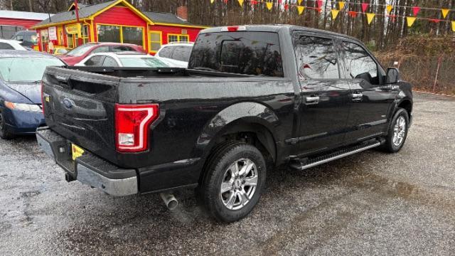 2015 Black Ford F-150 XLT SuperCrew 6.5-ft (1FTEW1CPXFF) with an 2.7L V6 DOHC 24V engine, 6-Speed Automatic transmission, located at 1806 Veterans Memorial Hwy SW, Austell, GA, 30168, (770) 944-9558, 33.817959, -84.606987 - Photo#3