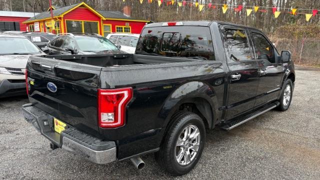 2015 Black Ford F-150 XLT SuperCrew 6.5-ft (1FTEW1CPXFF) with an 2.7L V6 DOHC 24V engine, 6-Speed Automatic transmission, located at 1806 Veterans Memorial Hwy SW, Austell, GA, 30168, (770) 944-9558, 33.817959, -84.606987 - Photo#23