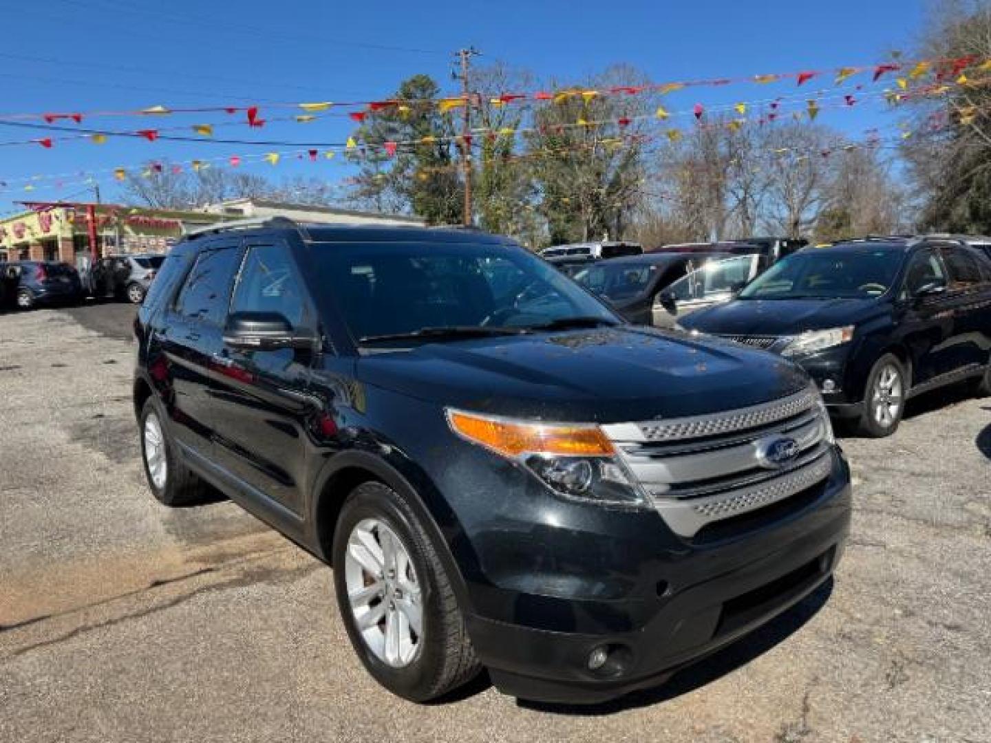 2013 Black Ford Explorer XLT (1FM5K7D87DG) with an 3.5L V-6 DOHC engine, located at 1806 Veterans Memorial Hwy SW, Austell, GA, 30168, (770) 944-9558, 33.817959, -84.606987 - Photo#2