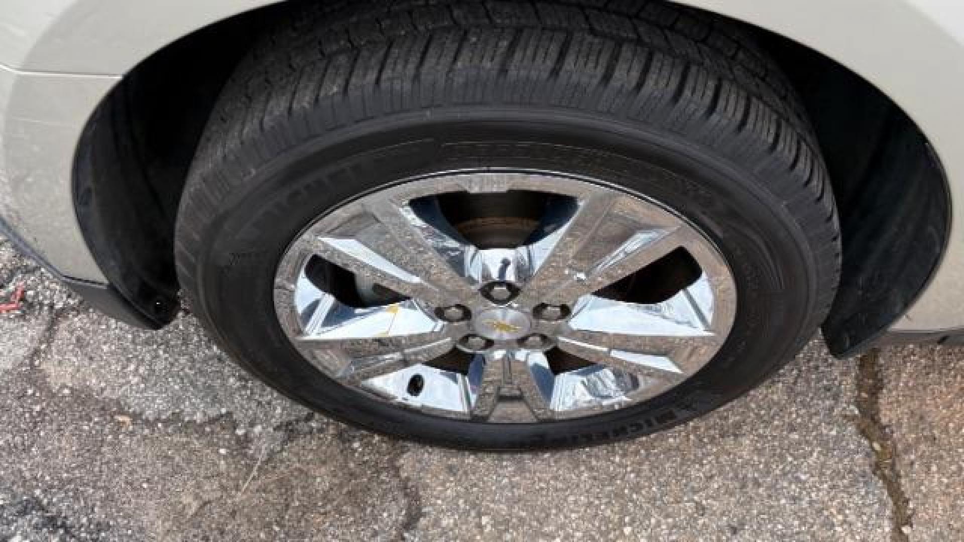 2014 Silver Chevrolet Equinox LTZ (2GNFLDE38E6) with an 2.4L I-4 gasoline direct injection engine, located at 1806 Veterans Memorial Hwy SW, Austell, GA, 30168, (770) 944-9558, 33.817959, -84.606987 - Photo#8