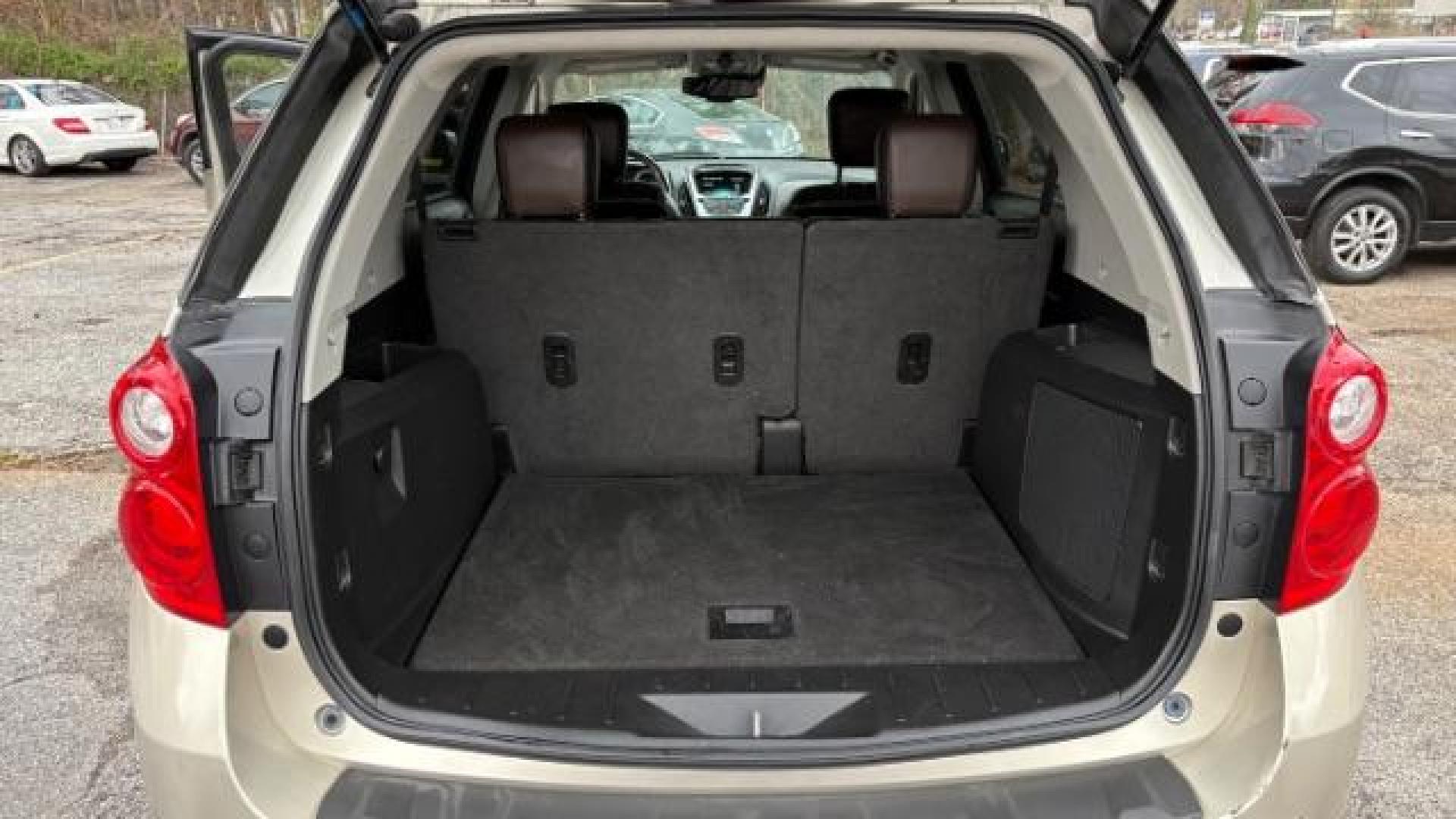 2014 Silver Chevrolet Equinox LTZ (2GNFLDE38E6) with an 2.4L I-4 gasoline direct injection engine, located at 1806 Veterans Memorial Hwy SW, Austell, GA, 30168, (770) 944-9558, 33.817959, -84.606987 - Photo#11
