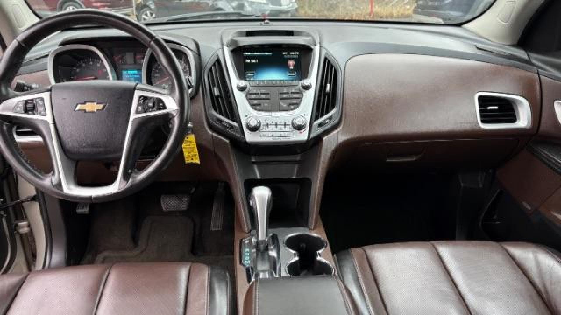 2014 Silver Chevrolet Equinox LTZ (2GNFLDE38E6) with an 2.4L I-4 gasoline direct injection engine, located at 1806 Veterans Memorial Hwy SW, Austell, GA, 30168, (770) 944-9558, 33.817959, -84.606987 - Photo#13