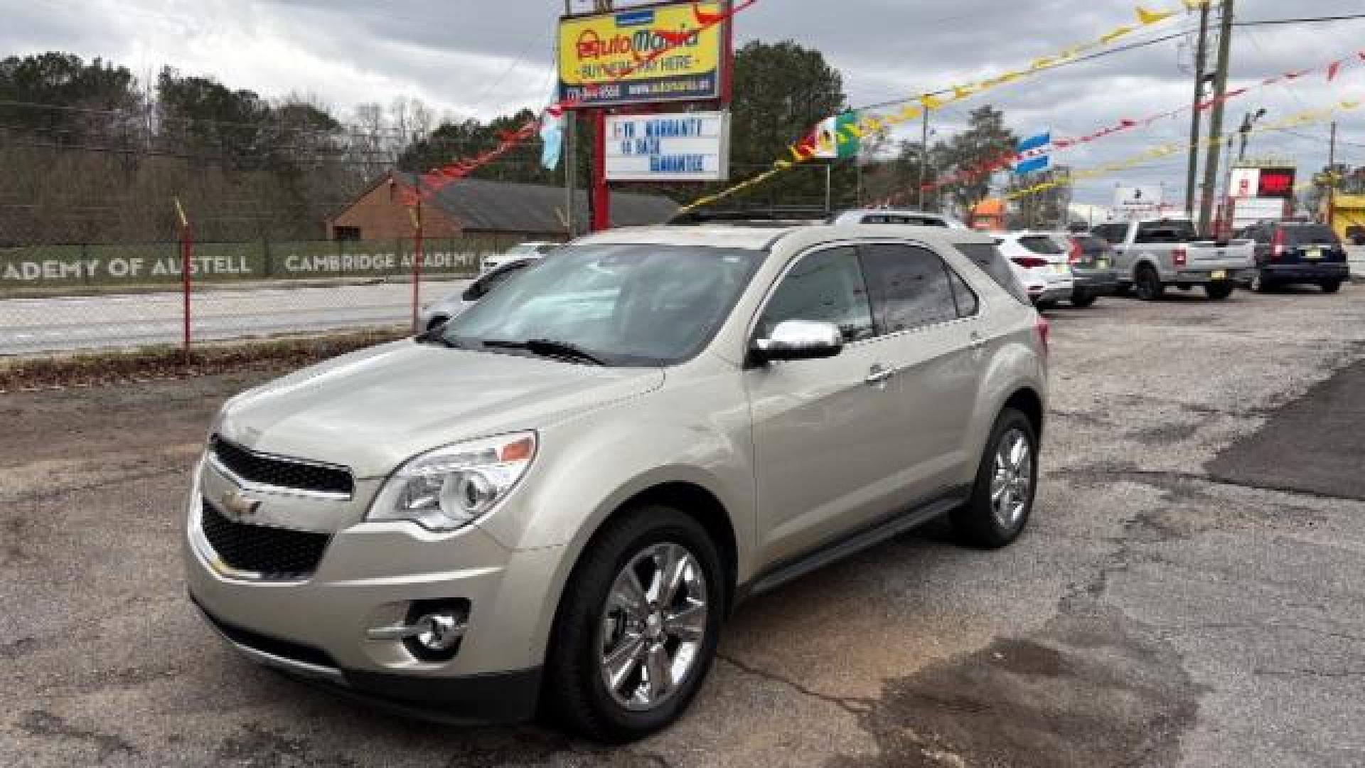 2014 Silver Chevrolet Equinox LTZ (2GNFLDE38E6) with an 2.4L I-4 gasoline direct injection engine, located at 1806 Veterans Memorial Hwy SW, Austell, GA, 30168, (770) 944-9558, 33.817959, -84.606987 - Photo#0