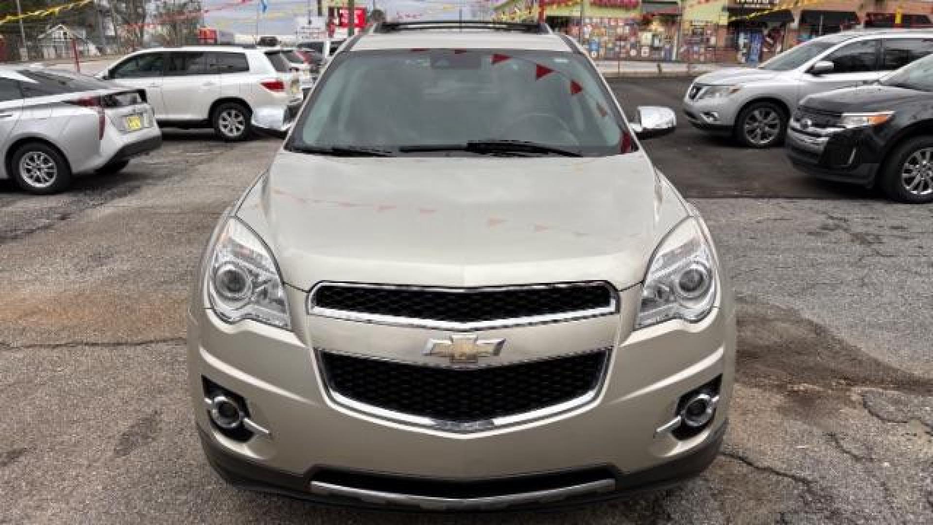 2014 Silver Chevrolet Equinox LTZ (2GNFLDE38E6) with an 2.4L I-4 gasoline direct injection engine, located at 1806 Veterans Memorial Hwy SW, Austell, GA, 30168, (770) 944-9558, 33.817959, -84.606987 - Photo#1