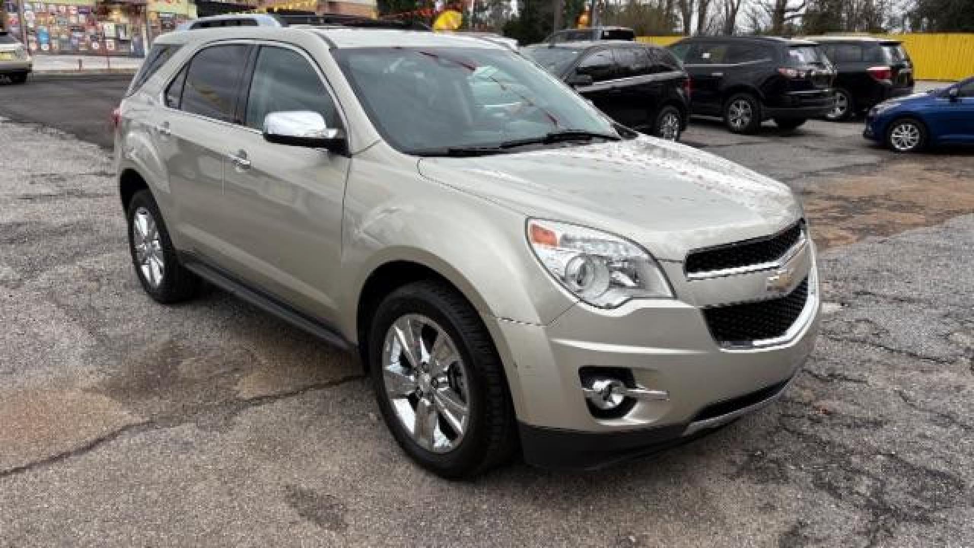 2014 Silver Chevrolet Equinox LTZ (2GNFLDE38E6) with an 2.4L I-4 gasoline direct injection engine, located at 1806 Veterans Memorial Hwy SW, Austell, GA, 30168, (770) 944-9558, 33.817959, -84.606987 - Photo#2