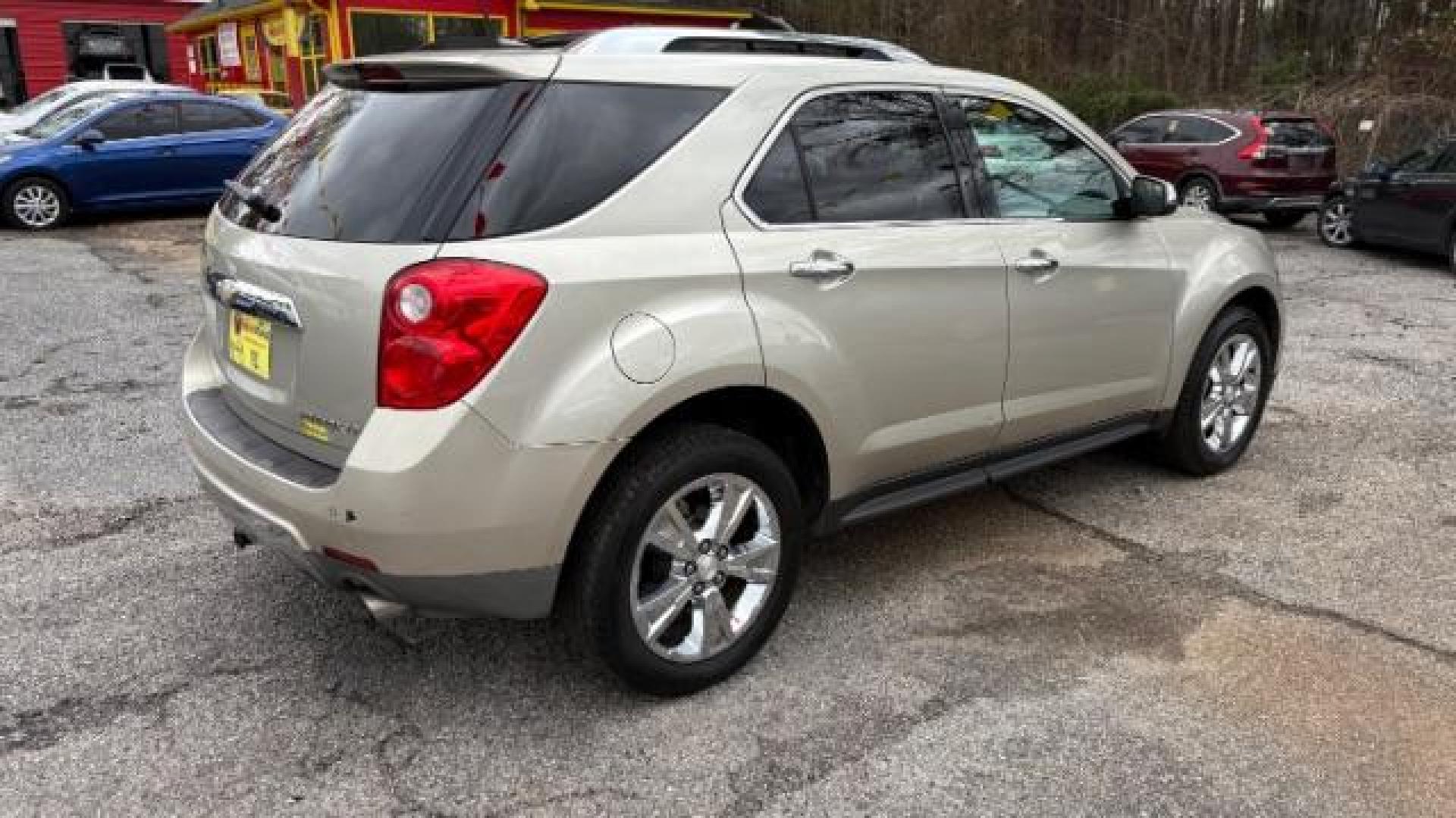 2014 Silver Chevrolet Equinox LTZ (2GNFLDE38E6) with an 2.4L I-4 gasoline direct injection engine, located at 1806 Veterans Memorial Hwy SW, Austell, GA, 30168, (770) 944-9558, 33.817959, -84.606987 - Photo#3
