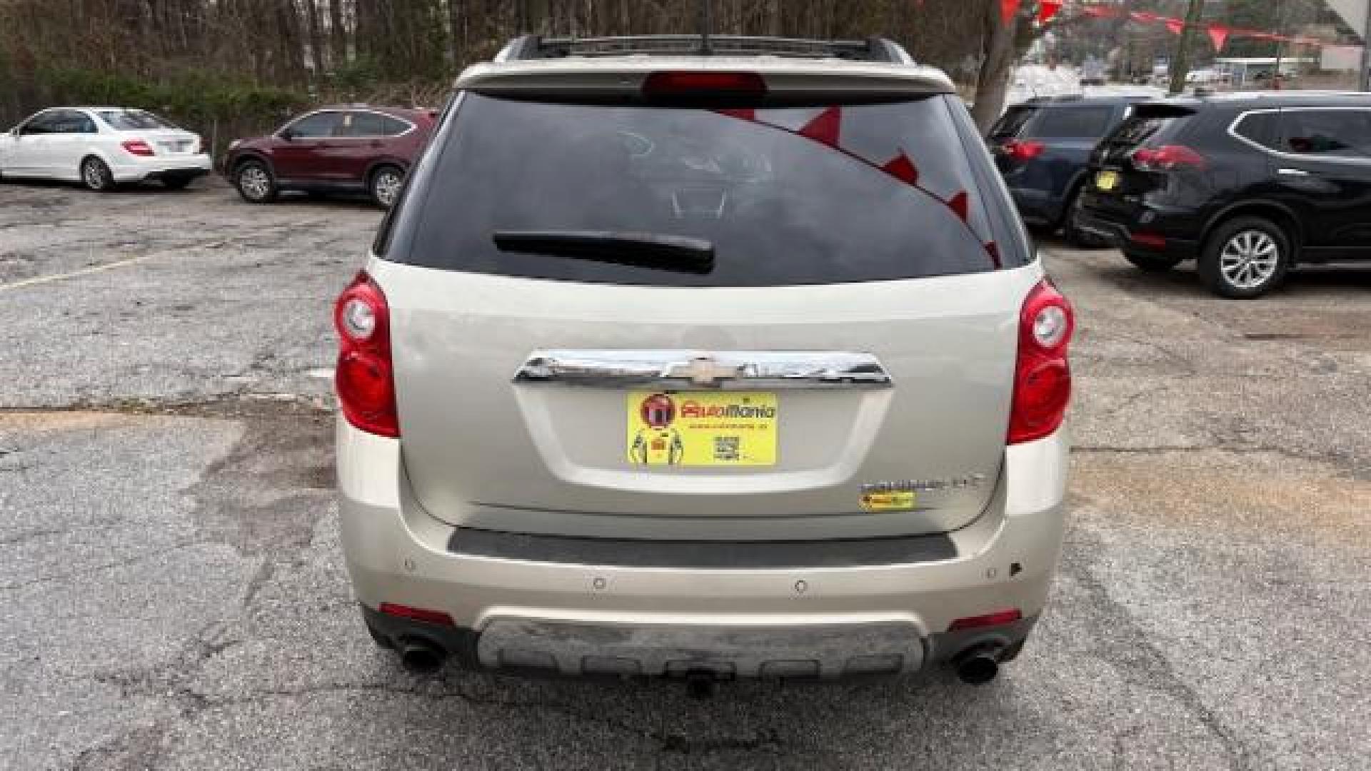 2014 Silver Chevrolet Equinox LTZ (2GNFLDE38E6) with an 2.4L I-4 gasoline direct injection engine, located at 1806 Veterans Memorial Hwy SW, Austell, GA, 30168, (770) 944-9558, 33.817959, -84.606987 - Photo#4