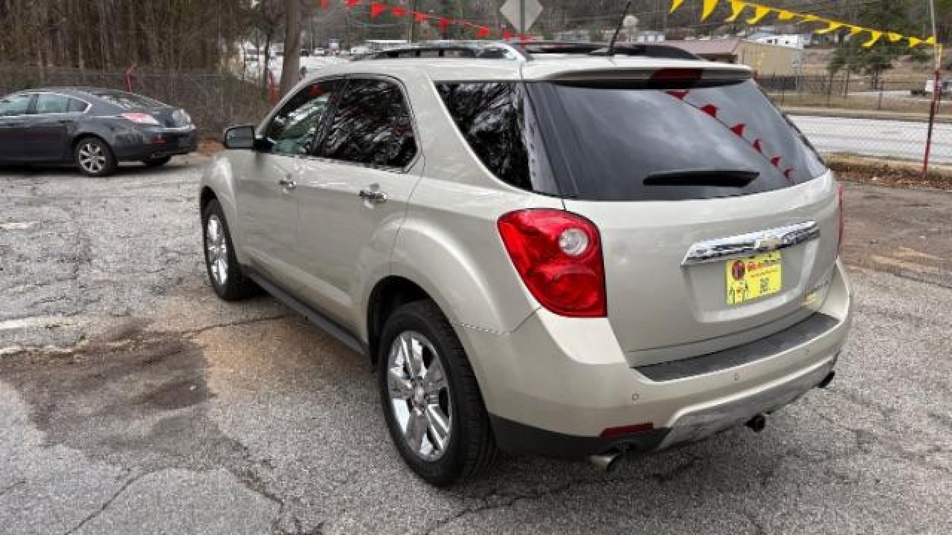 2014 Silver Chevrolet Equinox LTZ (2GNFLDE38E6) with an 2.4L I-4 gasoline direct injection engine, located at 1806 Veterans Memorial Hwy SW, Austell, GA, 30168, (770) 944-9558, 33.817959, -84.606987 - Photo#5