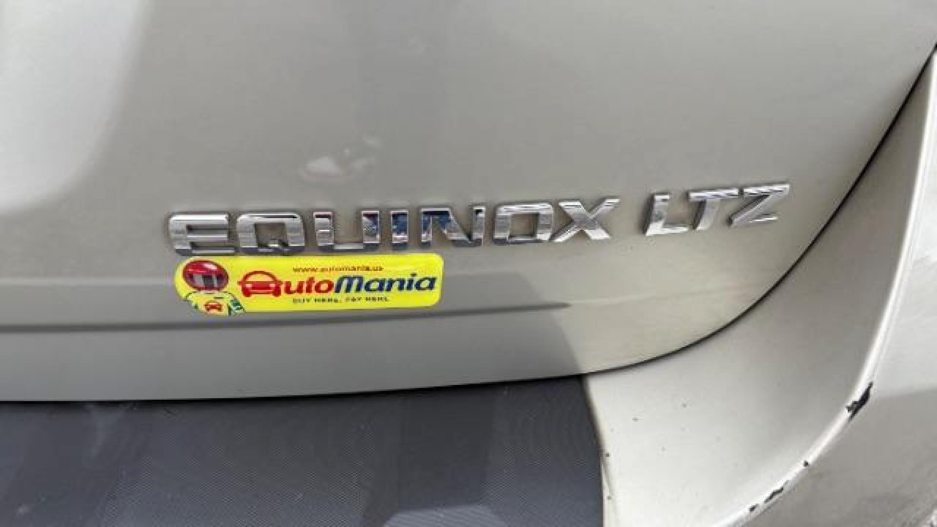 2014 Silver Chevrolet Equinox LTZ (2GNFLDE38E6) with an 2.4L I-4 gasoline direct injection engine, located at 1806 Veterans Memorial Hwy SW, Austell, GA, 30168, (770) 944-9558, 33.817959, -84.606987 - Photo#6