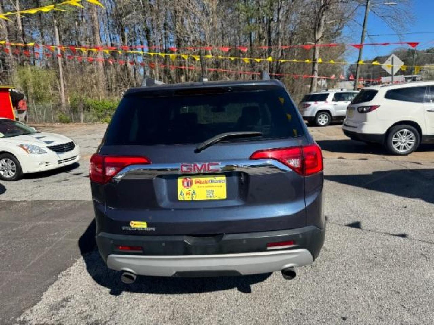 2019 Blue GMC Acadia SLT-1 (1GKKNMLS1KZ) with an 2.5L I-4 gasoline direct injection engine, Automatic transmission, located at 1806 Veterans Memorial Hwy SW, Austell, GA, 30168, (770) 944-9558, 33.817959, -84.606987 - Photo#4