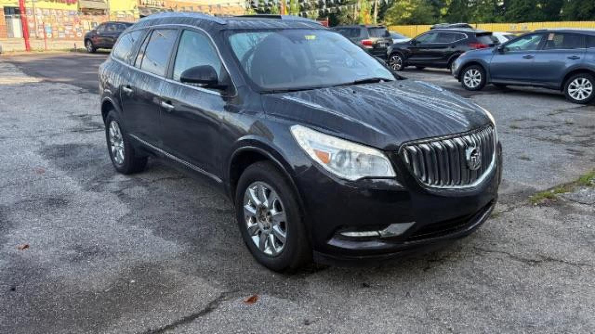 2014 Gray Buick Enclave Premium (5GAKRCKD8EJ) with an 3.6L V-6 gasoline direct injection engine, located at 1806 Veterans Memorial Hwy SW, Austell, GA, 30168, (770) 944-9558, 33.817959, -84.606987 - Photo#2