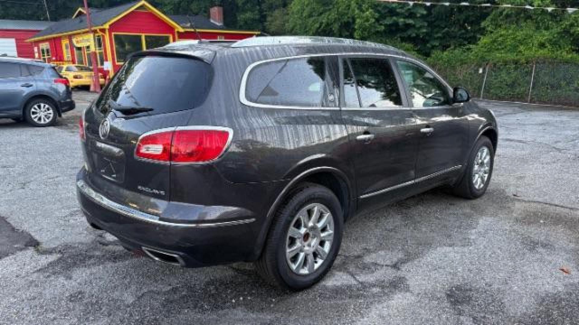 2014 Gray Buick Enclave Premium (5GAKRCKD8EJ) with an 3.6L V-6 gasoline direct injection engine, located at 1806 Veterans Memorial Hwy SW, Austell, GA, 30168, (770) 944-9558, 33.817959, -84.606987 - Photo#3