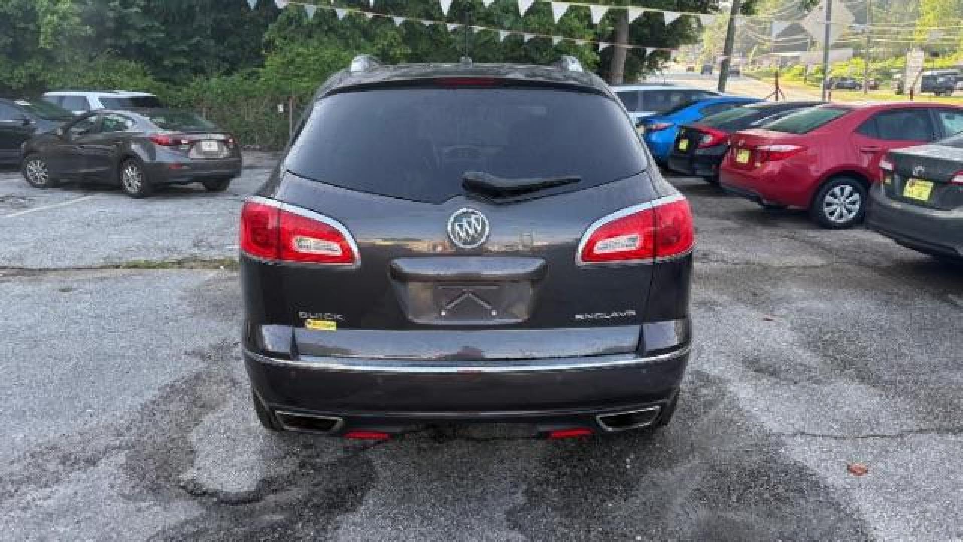 2014 Gray Buick Enclave Premium (5GAKRCKD8EJ) with an 3.6L V-6 gasoline direct injection engine, located at 1806 Veterans Memorial Hwy SW, Austell, GA, 30168, (770) 944-9558, 33.817959, -84.606987 - Photo#4
