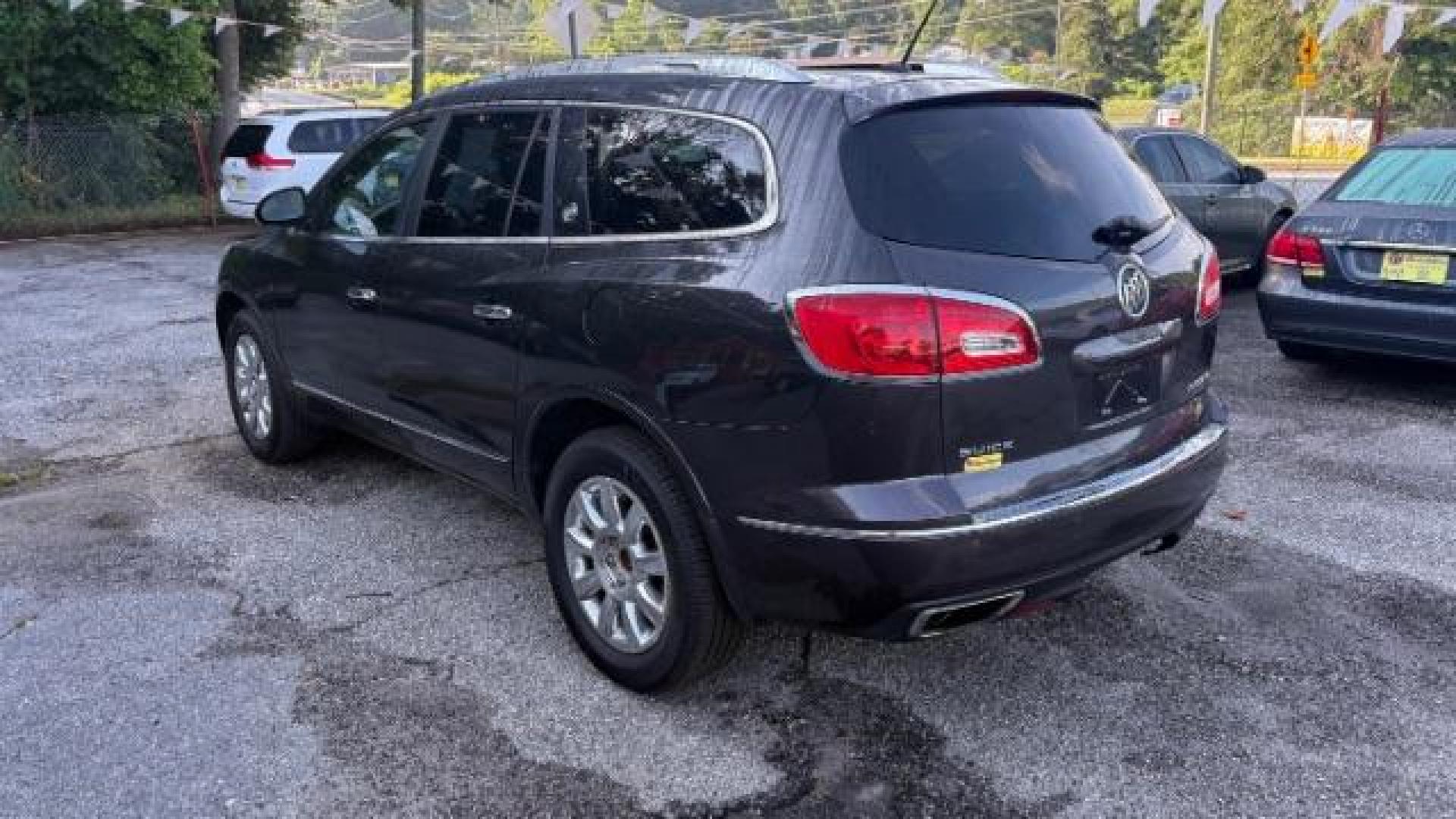 2014 Gray Buick Enclave Premium (5GAKRCKD8EJ) with an 3.6L V-6 gasoline direct injection engine, located at 1806 Veterans Memorial Hwy SW, Austell, GA, 30168, (770) 944-9558, 33.817959, -84.606987 - Photo#5