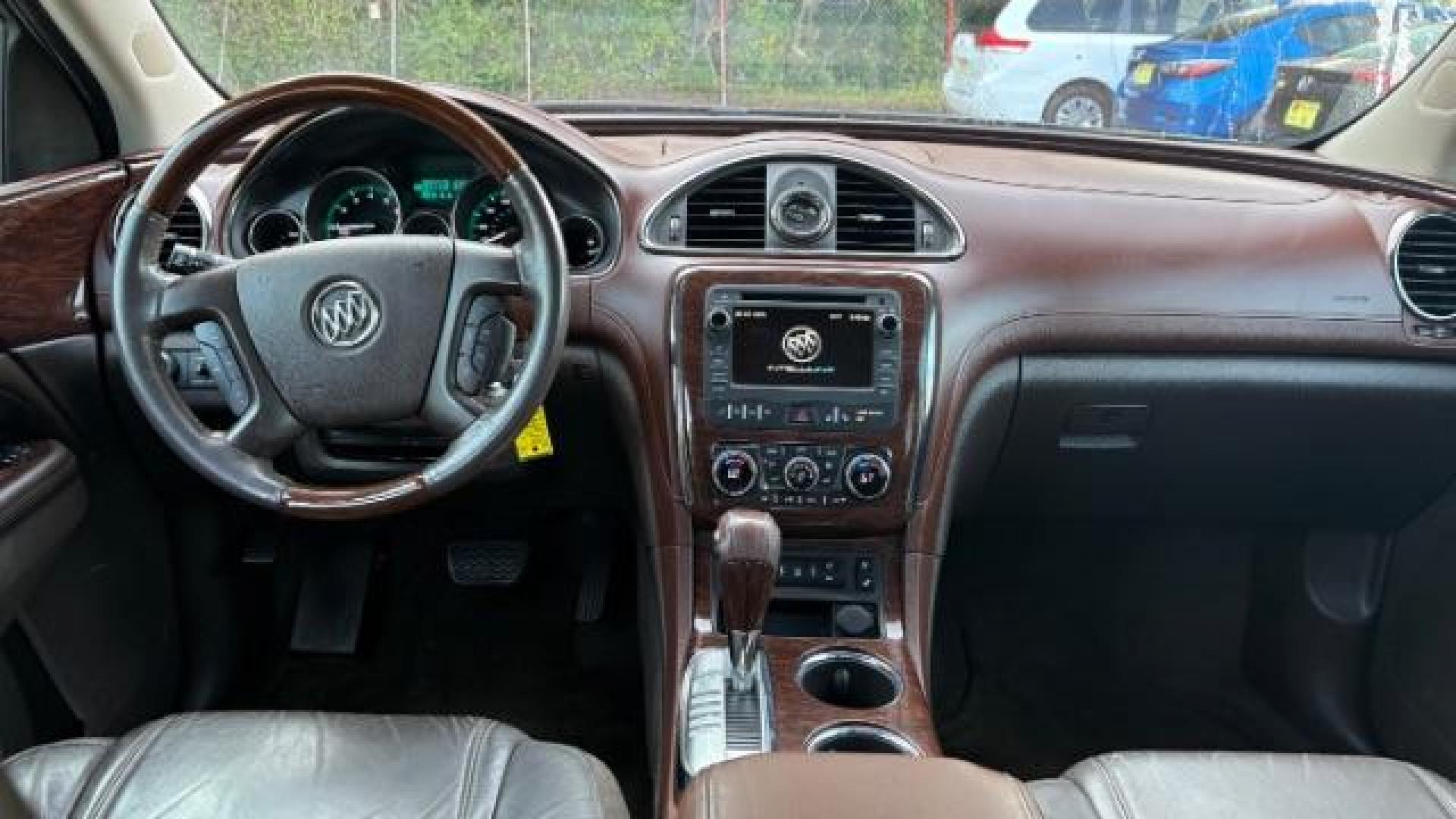 2014 Gray Buick Enclave Premium (5GAKRCKD8EJ) with an 3.6L V-6 gasoline direct injection engine, located at 1806 Veterans Memorial Hwy SW, Austell, GA, 30168, (770) 944-9558, 33.817959, -84.606987 - Photo#8