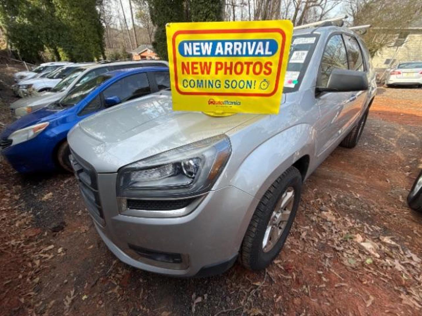 2014 Silver GMC Acadia SLE-1 (1GKKRNED9EJ) with an 3.6L V-6 gasoline direct injection engine, located at 1806 Veterans Memorial Hwy SW, Austell, GA, 30168, (770) 944-9558, 33.817959, -84.606987 - Photo#0