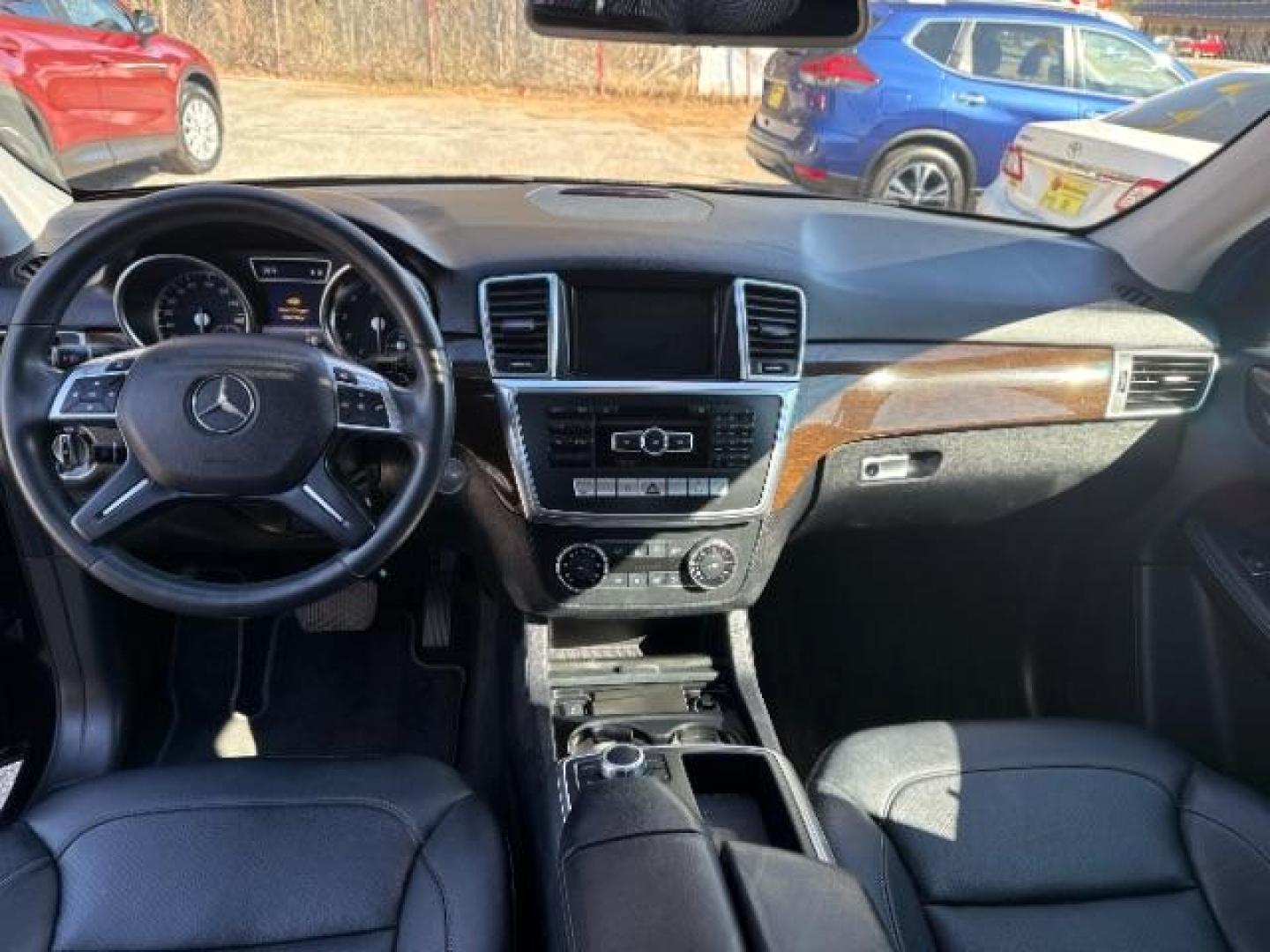 2015 Black Mercedes - Benz M-Class ML 350 (4JGDA5JB6FA) , located at 1806 Veterans Memorial Hwy SW, Austell, GA, 30168, (770) 944-9558, 33.817959, -84.606987 - Photo#16