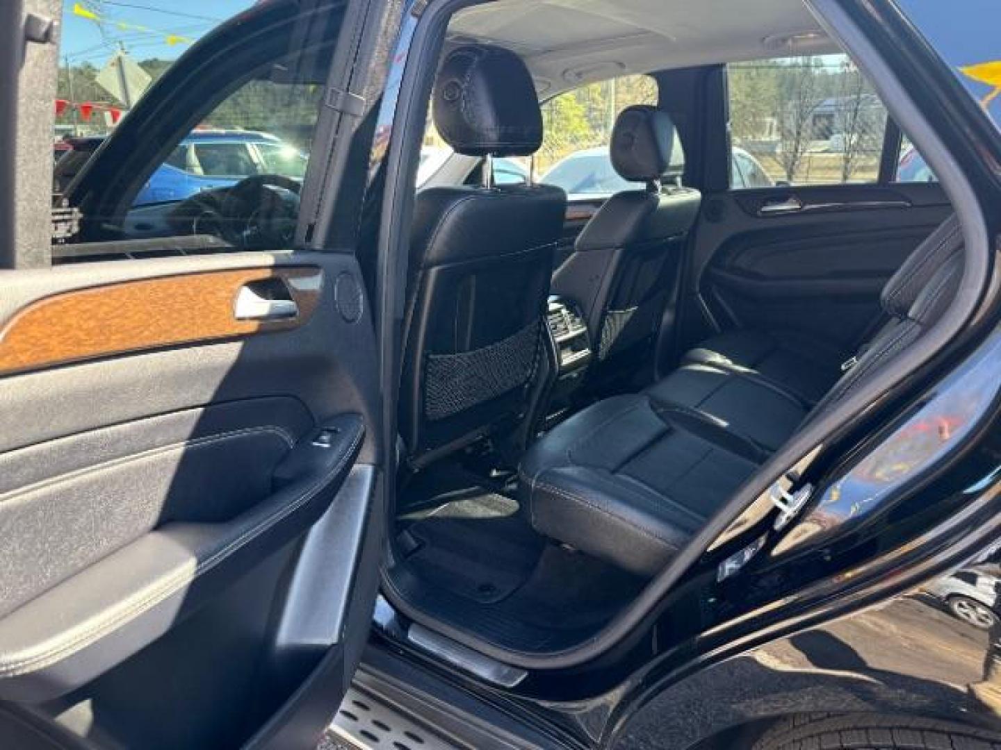 2015 Black Mercedes - Benz M-Class ML 350 (4JGDA5JB6FA) , located at 1806 Veterans Memorial Hwy SW, Austell, GA, 30168, (770) 944-9558, 33.817959, -84.606987 - Photo#17