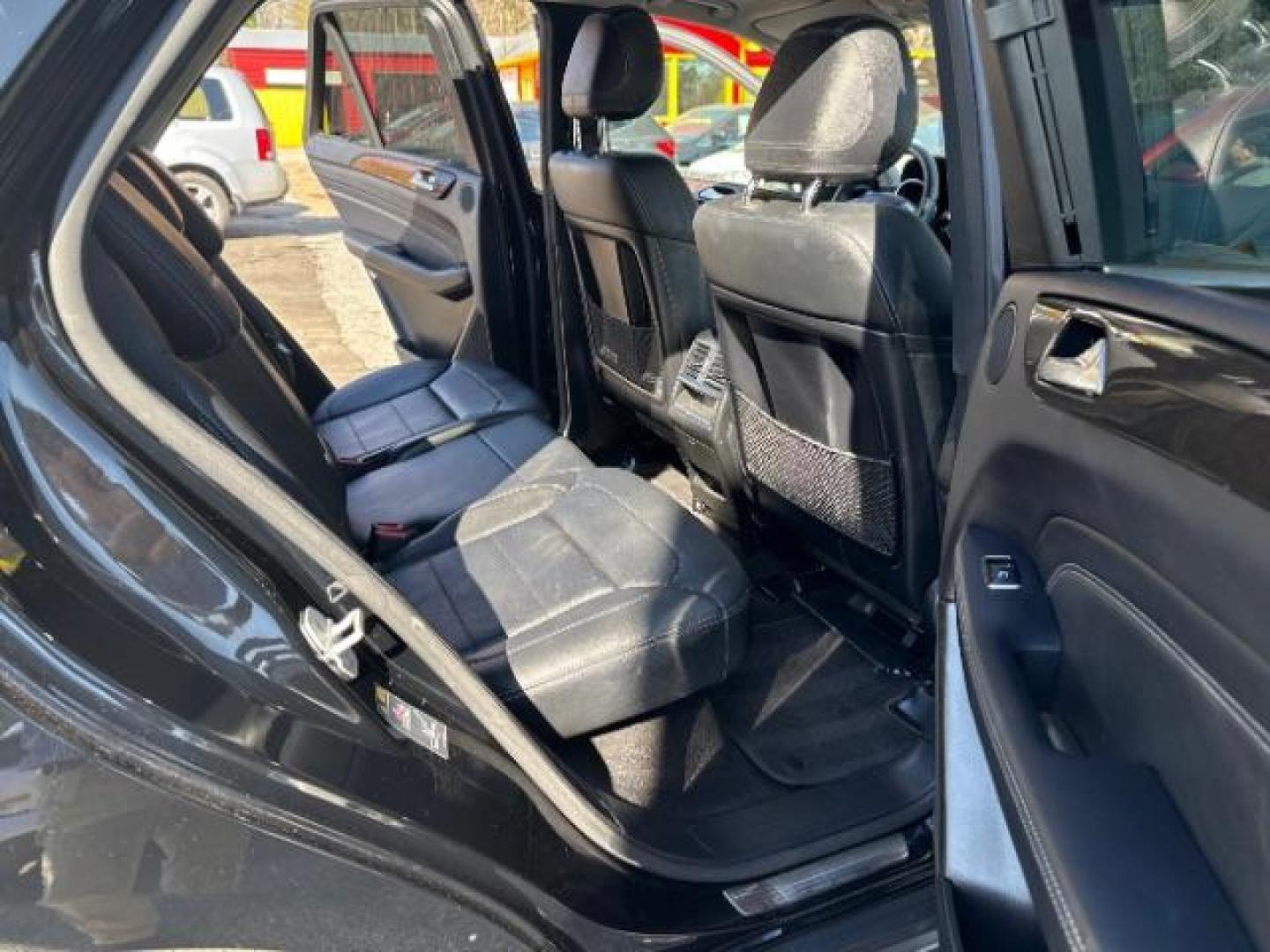 2015 Black Mercedes - Benz M-Class ML 350 (4JGDA5JB6FA) , located at 1806 Veterans Memorial Hwy SW, Austell, GA, 30168, (770) 944-9558, 33.817959, -84.606987 - Photo#20