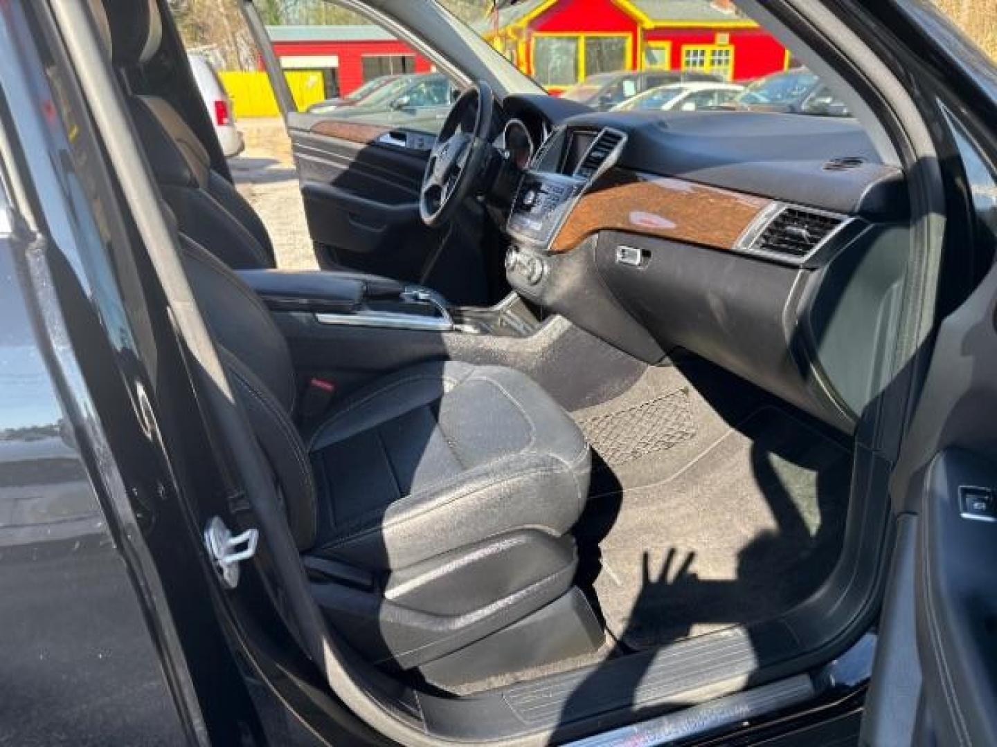 2015 Black Mercedes - Benz M-Class ML 350 (4JGDA5JB6FA) , located at 1806 Veterans Memorial Hwy SW, Austell, GA, 30168, (770) 944-9558, 33.817959, -84.606987 - Photo#21