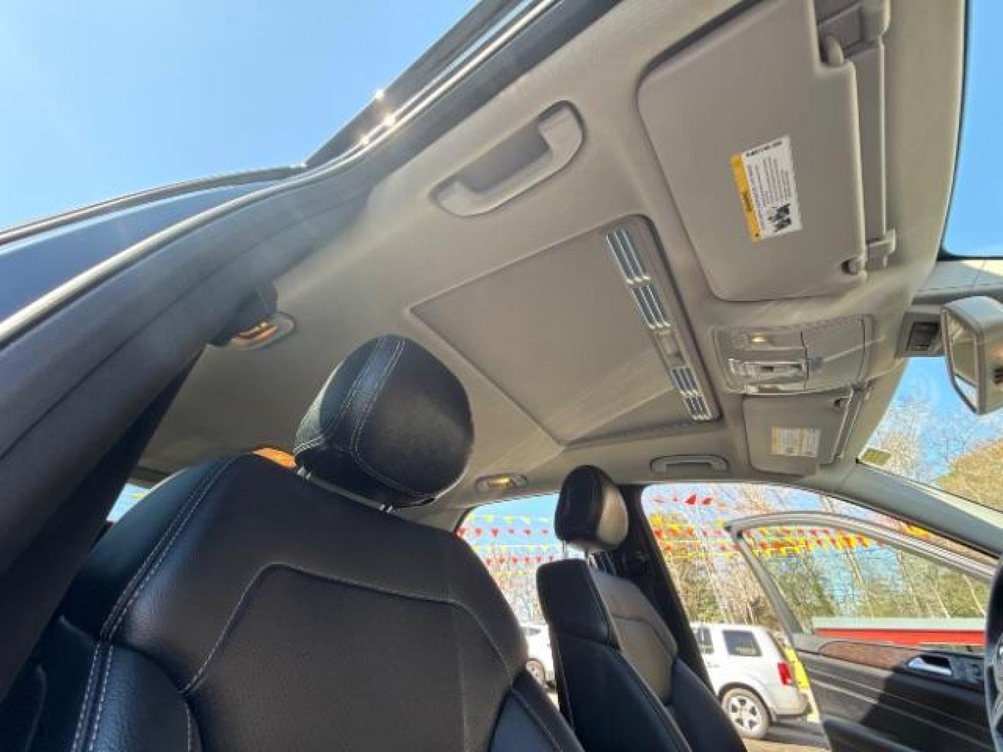 2015 Black Mercedes - Benz M-Class ML 350 (4JGDA5JB6FA) , located at 1806 Veterans Memorial Hwy SW, Austell, GA, 30168, (770) 944-9558, 33.817959, -84.606987 - Photo#22