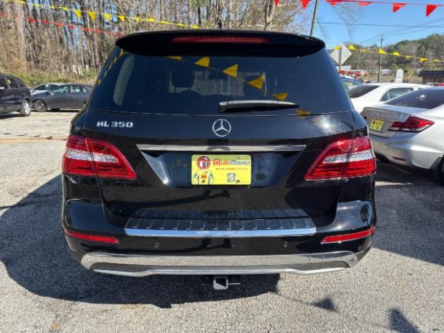 2015 Black Mercedes - Benz M-Class ML 350 (4JGDA5JB6FA) , located at 1806 Veterans Memorial Hwy SW, Austell, GA, 30168, (770) 944-9558, 33.817959, -84.606987 - Photo#4