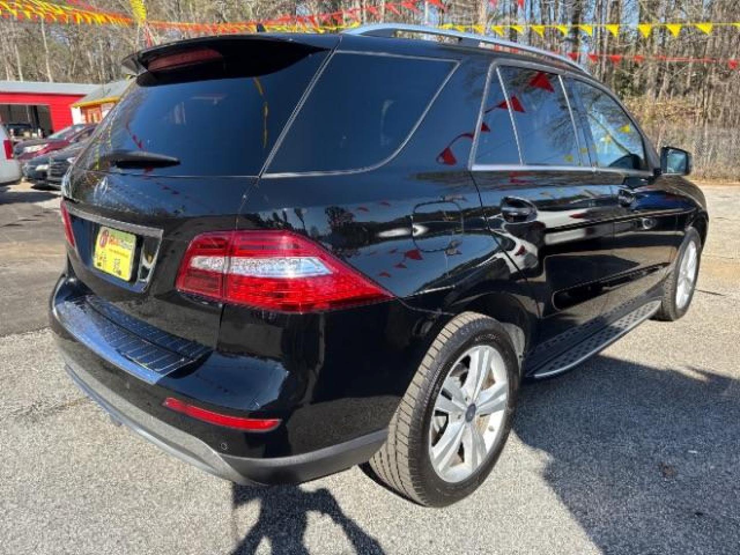 2015 Black Mercedes - Benz M-Class ML 350 (4JGDA5JB6FA) , located at 1806 Veterans Memorial Hwy SW, Austell, GA, 30168, (770) 944-9558, 33.817959, -84.606987 - Photo#7