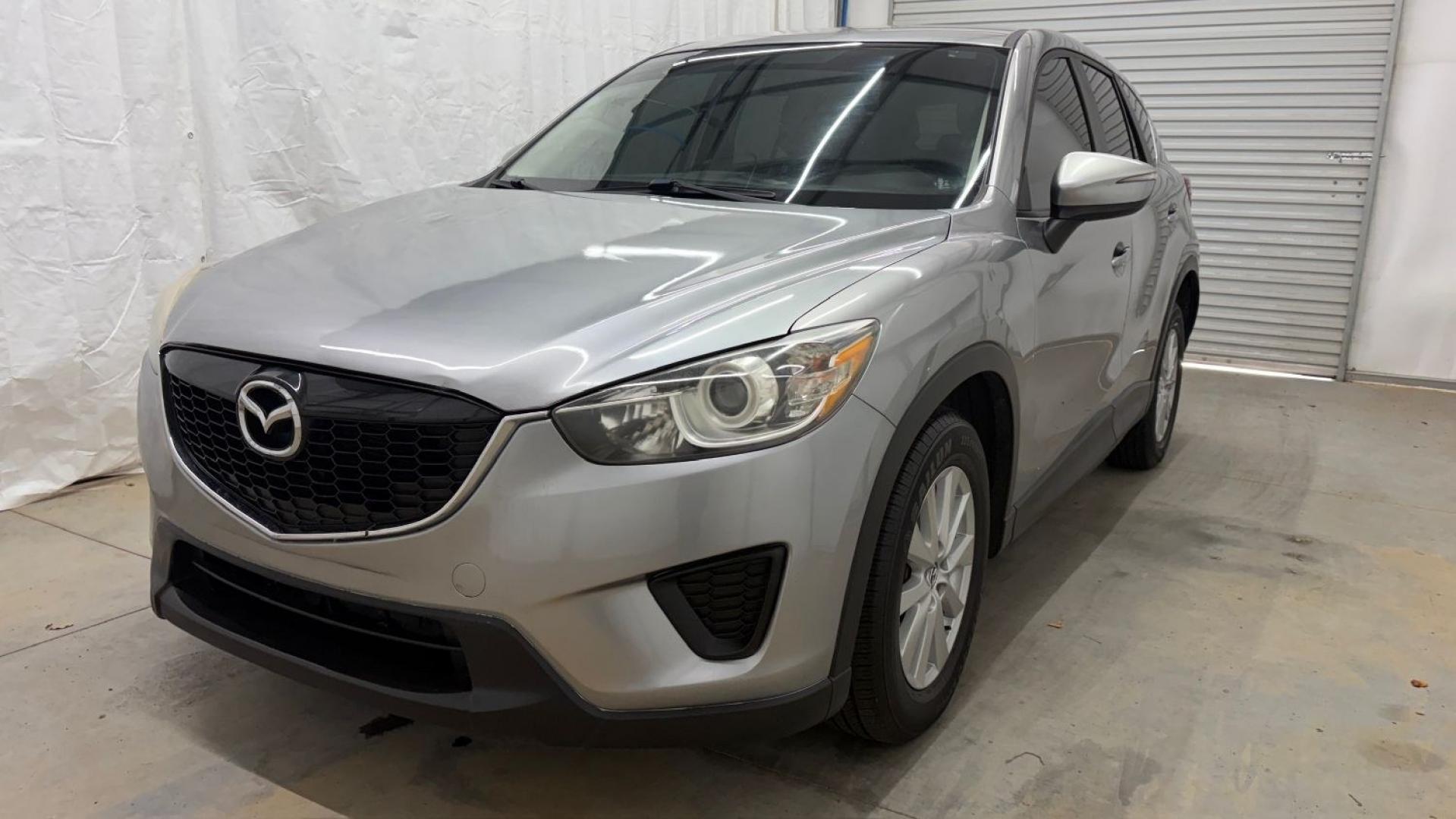 2015 Silver Mazda CX-5 Sport (JM3KE2BE0F0) with an 2.0L I-4 DI DOHC engine, located at 1806 Veterans Memorial Hwy SW, Austell, GA, 30168, (770) 944-9558, 33.817959, -84.606987- Photo#0
