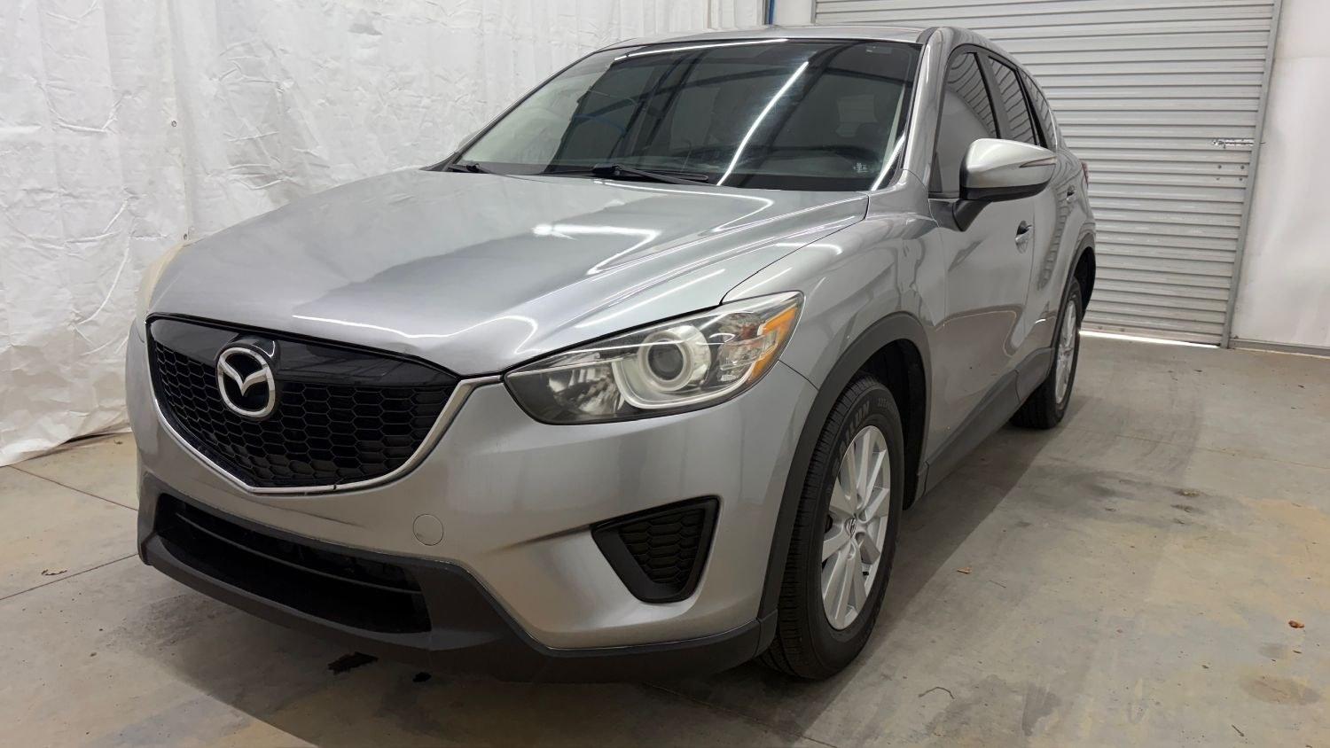 2015 Silver Mazda CX-5 Sport (JM3KE2BE0F0) with an 2.0L I-4 DI DOHC engine, located at 1806 Veterans Memorial Hwy SW, Austell, GA, 30168, (770) 944-9558, 33.817959, -84.606987- Photo#0