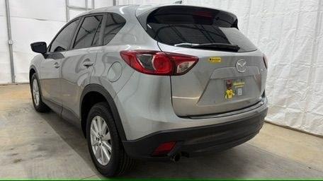2015 Silver Mazda CX-5 Sport (JM3KE2BE0F0) with an 2.0L I-4 DI DOHC engine, located at 1806 Veterans Memorial Hwy SW, Austell, GA, 30168, (770) 944-9558, 33.817959, -84.606987- Photo#3