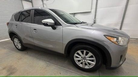 2015 Silver Mazda CX-5 Sport (JM3KE2BE0F0) with an 2.0L I-4 DI DOHC engine, located at 1806 Veterans Memorial Hwy SW, Austell, GA, 30168, (770) 944-9558, 33.817959, -84.606987- Photo#7