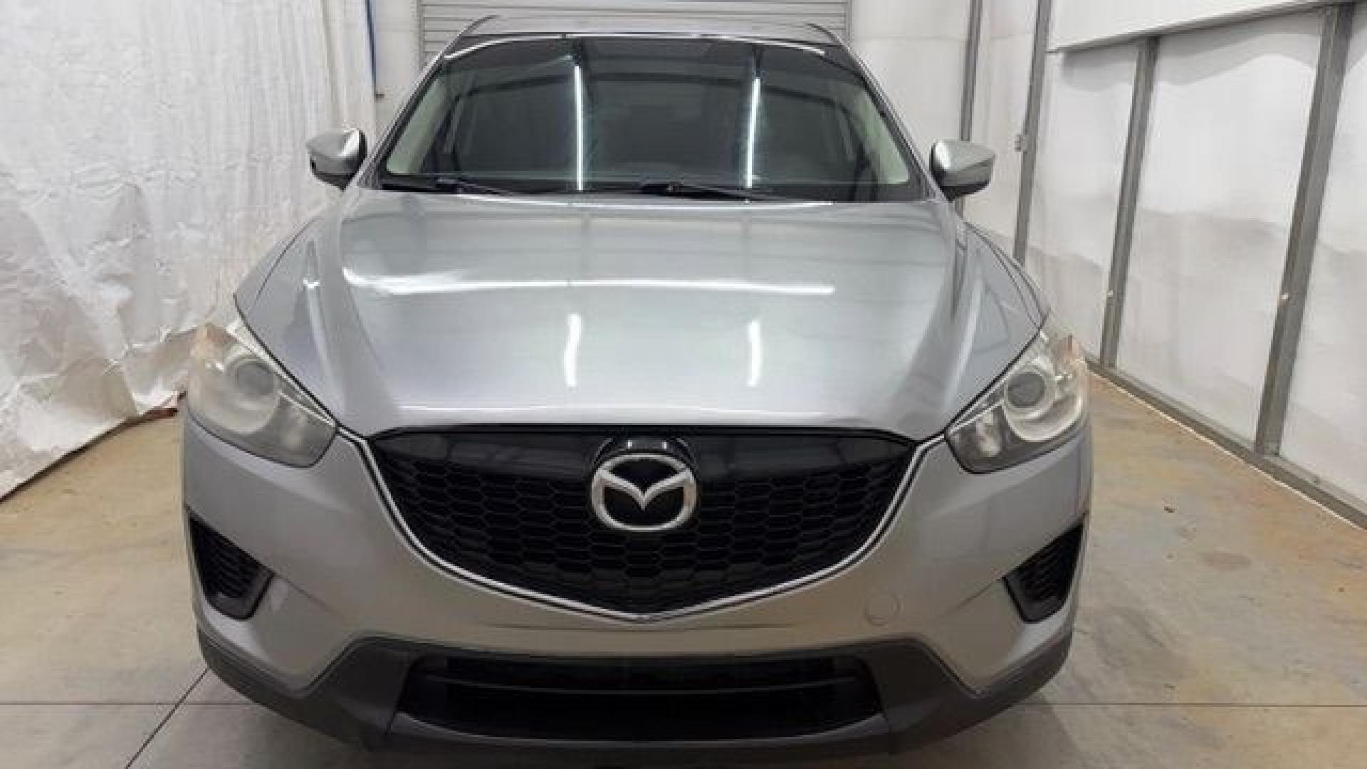 2015 Silver Mazda CX-5 Sport (JM3KE2BE0F0) with an 2.0L I-4 DI DOHC engine, located at 1806 Veterans Memorial Hwy SW, Austell, GA, 30168, (770) 944-9558, 33.817959, -84.606987- Photo#9