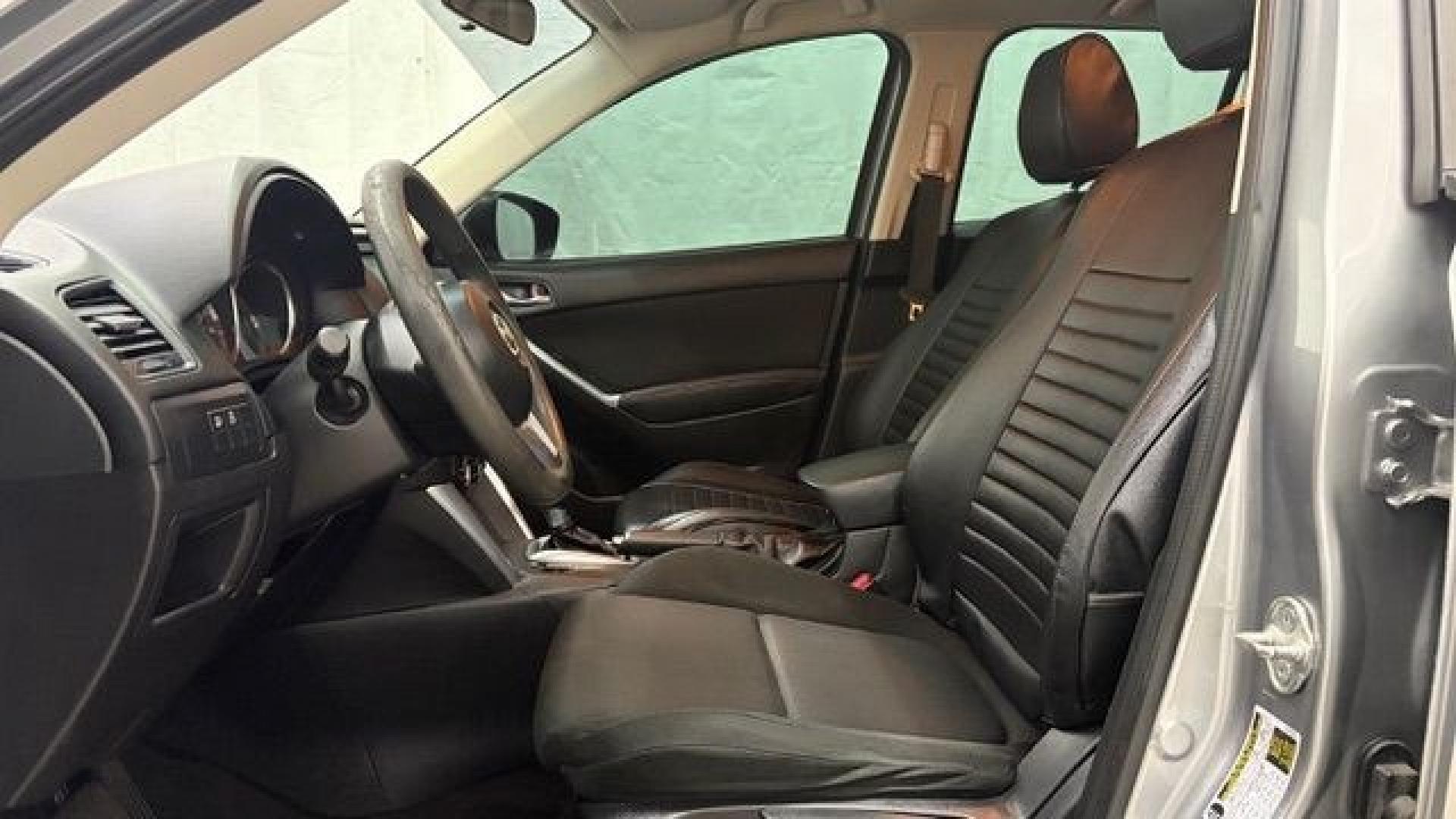 2015 Silver Mazda CX-5 Sport (JM3KE2BE0F0) with an 2.0L I-4 DI DOHC engine, located at 1806 Veterans Memorial Hwy SW, Austell, GA, 30168, (770) 944-9558, 33.817959, -84.606987- Photo#11