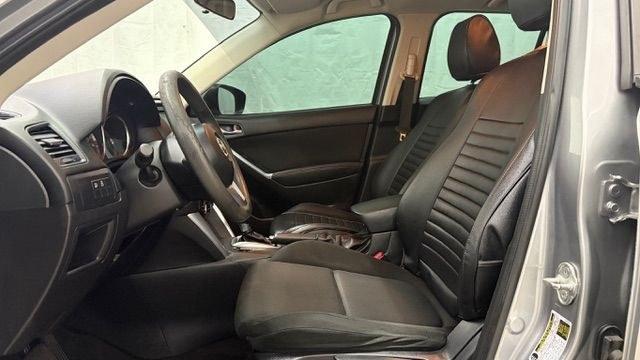 2015 Silver Mazda CX-5 Sport (JM3KE2BE0F0) with an 2.0L I-4 DI DOHC engine, located at 1806 Veterans Memorial Hwy SW, Austell, GA, 30168, (770) 944-9558, 33.817959, -84.606987- Photo#11