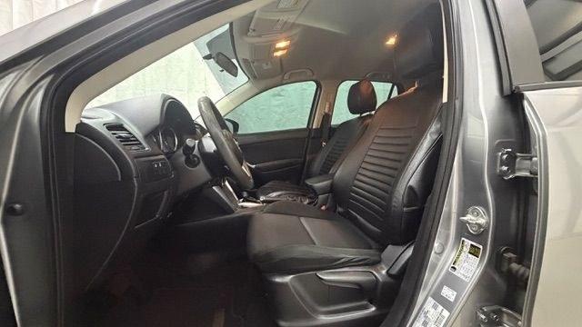 2015 Silver Mazda CX-5 Sport (JM3KE2BE0F0) with an 2.0L I-4 DI DOHC engine, located at 1806 Veterans Memorial Hwy SW, Austell, GA, 30168, (770) 944-9558, 33.817959, -84.606987- Photo#12