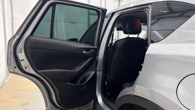 2015 Silver Mazda CX-5 Sport (JM3KE2BE0F0) with an 2.0L I-4 DI DOHC engine, located at 1806 Veterans Memorial Hwy SW, Austell, GA, 30168, (770) 944-9558, 33.817959, -84.606987- Photo#13